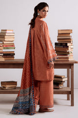 Amber Mirage — rust khaddar 3PC printed suit by Cross Stitch for timeless winter charm. 🍂