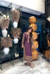 Detailed hand embroidery on tissue silk bridal gown featuring dabka, tilla, and sequins