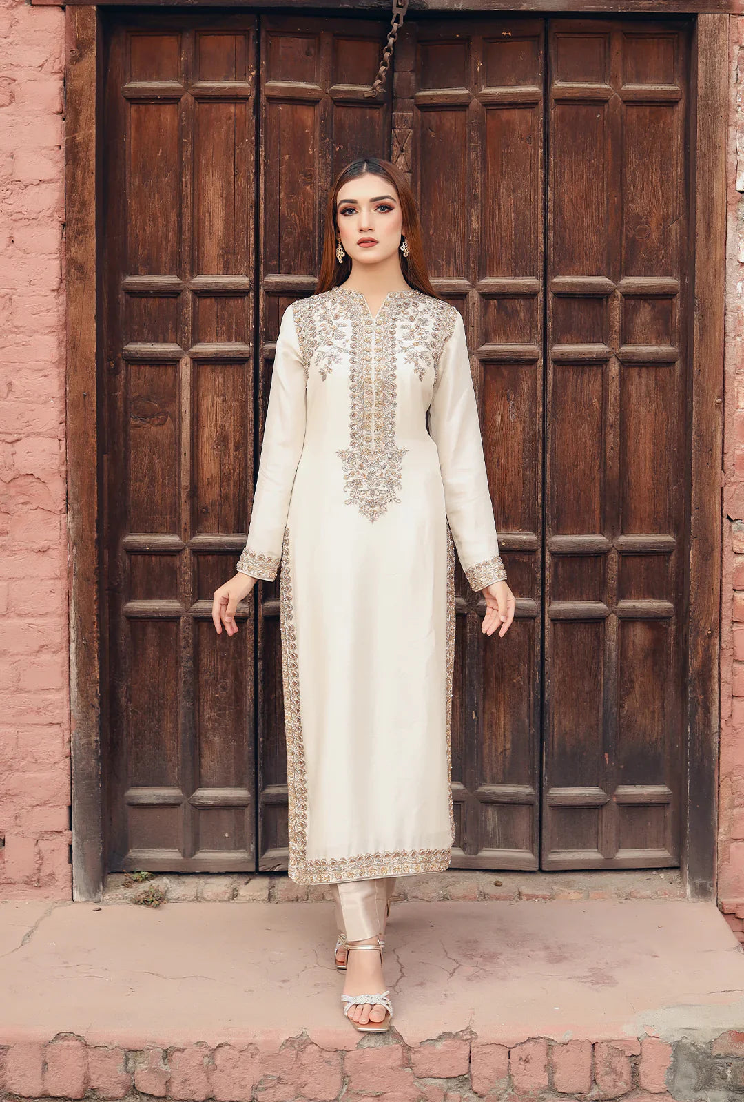 Front view of Abeer-E-Sahar cream bridal dress in 60 gram raw silk with dabka work