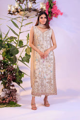 Front view of Ivory Blossom ivory festive dress with gold and pastel floral embroidery by Bazzaz.