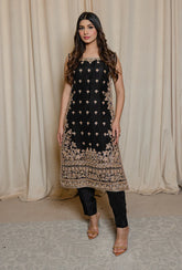 Front view of Siyah-E-Zar ink black bridal dress with dabka and nakshi embroidery