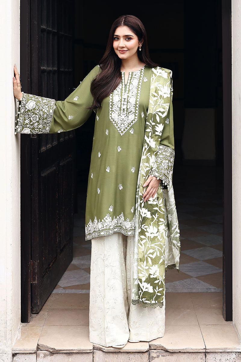 Soft linen, rich embroidery — the perfect winter look by Cross Stitch.
