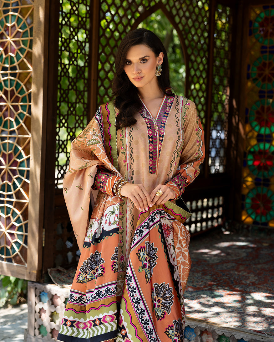 Mushq Solara Crest dress – embroidered luxury outfit from Nirvana Echoes Serenity, available online at Highway Fashion Pakistan