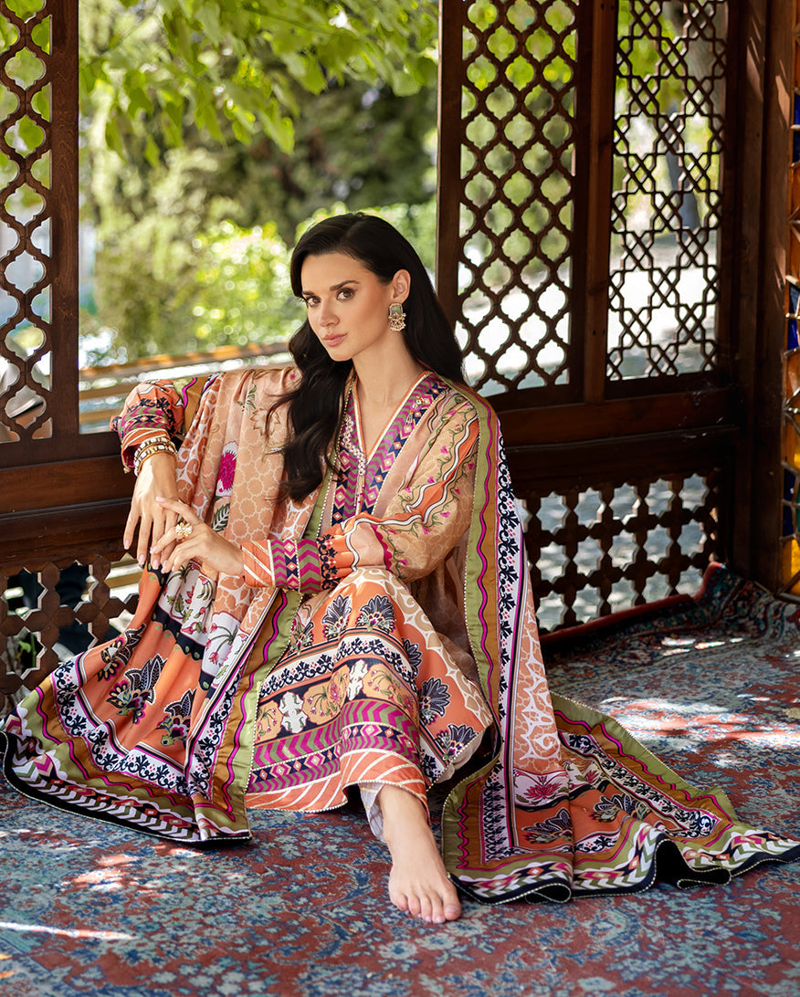 Mushq Solara Crest dress – embroidered luxury outfit from Nirvana Echoes Serenity, available online at Highway Fashion Pakistan