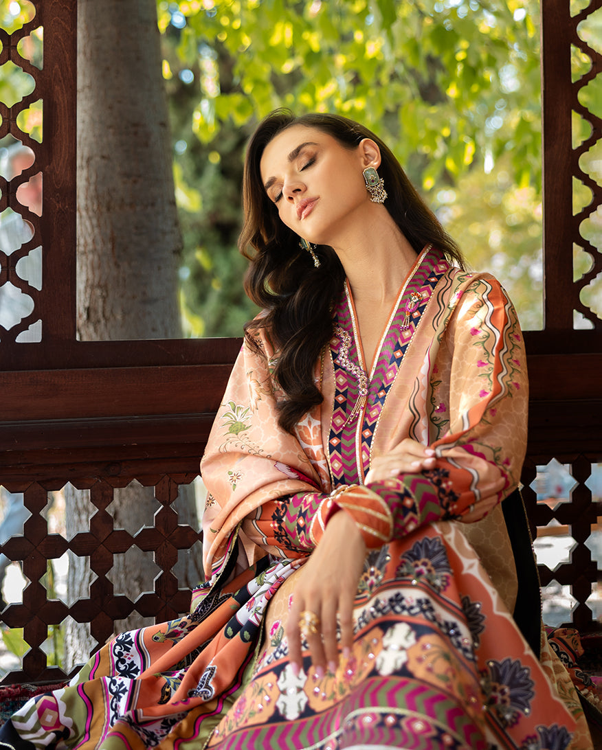 Mushq Solara Crest dress – embroidered luxury outfit from Nirvana Echoes Serenity, available online at Highway Fashion Pakistan