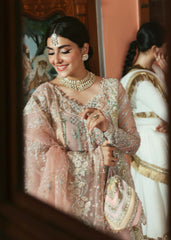 Festive Kanwal Malik Maahi ’25 Mehar dress with handwork borders, sequin spray, and rich jewel color.