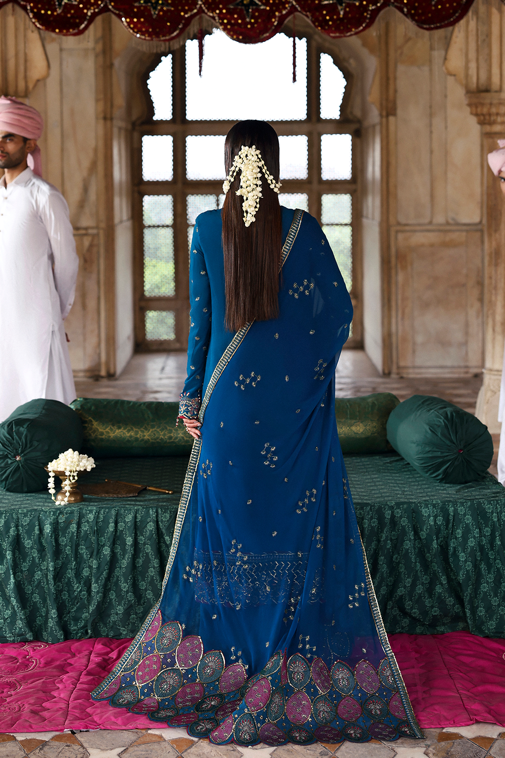 Back view of Emaan Adeel ZARQ blue formal dress with raw silk trouser