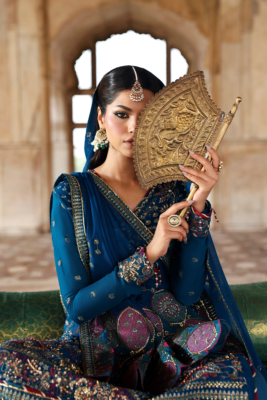 Close-up of handmade embroidery on ZARQ blue chiffon