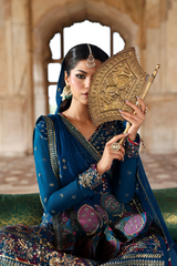 Close-up of handmade embroidery on ZARQ blue chiffon