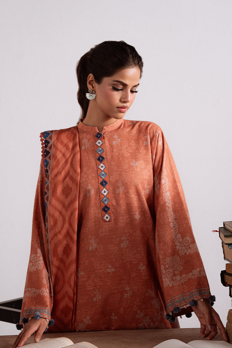 Amber Mirage — rust khaddar 3PC printed suit by Cross Stitch for timeless winter charm. 🍂
