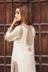 Back design of Abeer-E-Sahar bridal gown with nakshi and dabka embellishments