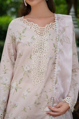 Close-up of embroidered organza neckline in UE-528