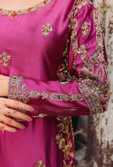 Closeup of dabka and nakshi hand embroidery on Gul-Rukh magenta bridal gown