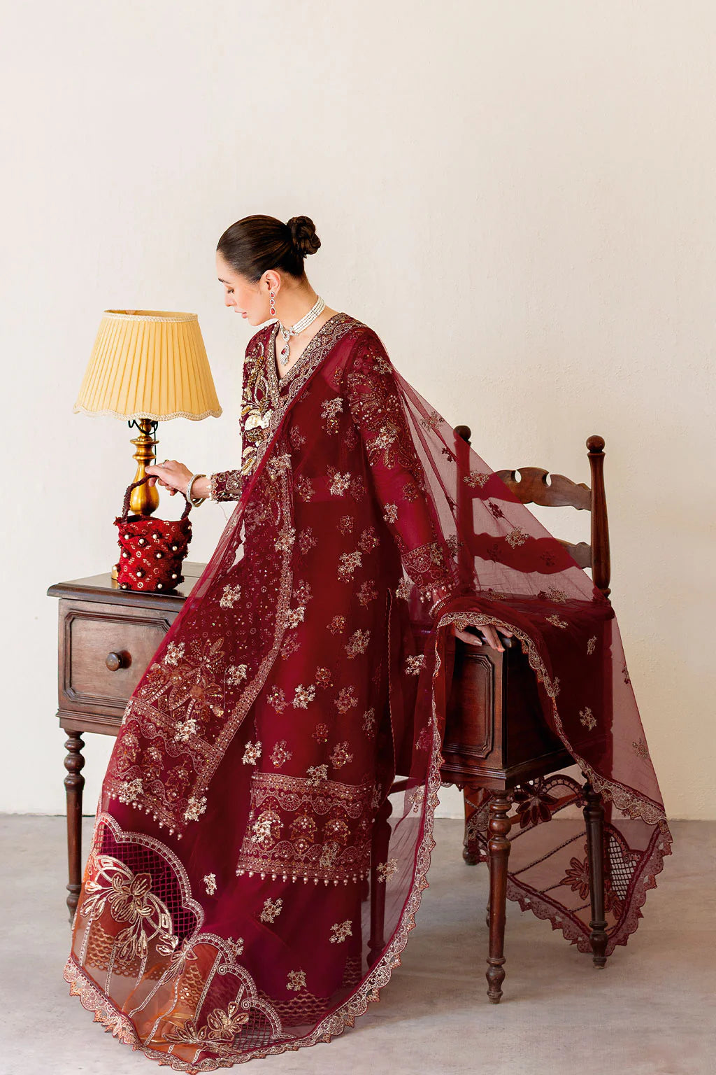 Closeup of embroidered and hand embellished sleeves in Ramsha H-504

