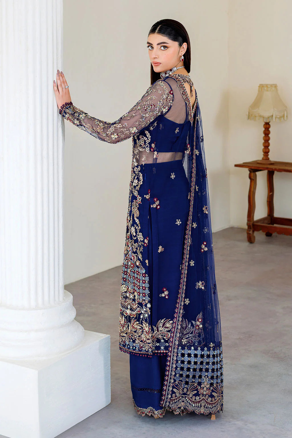 Embroidered net back with sequins and motif of Ramsha formal dress