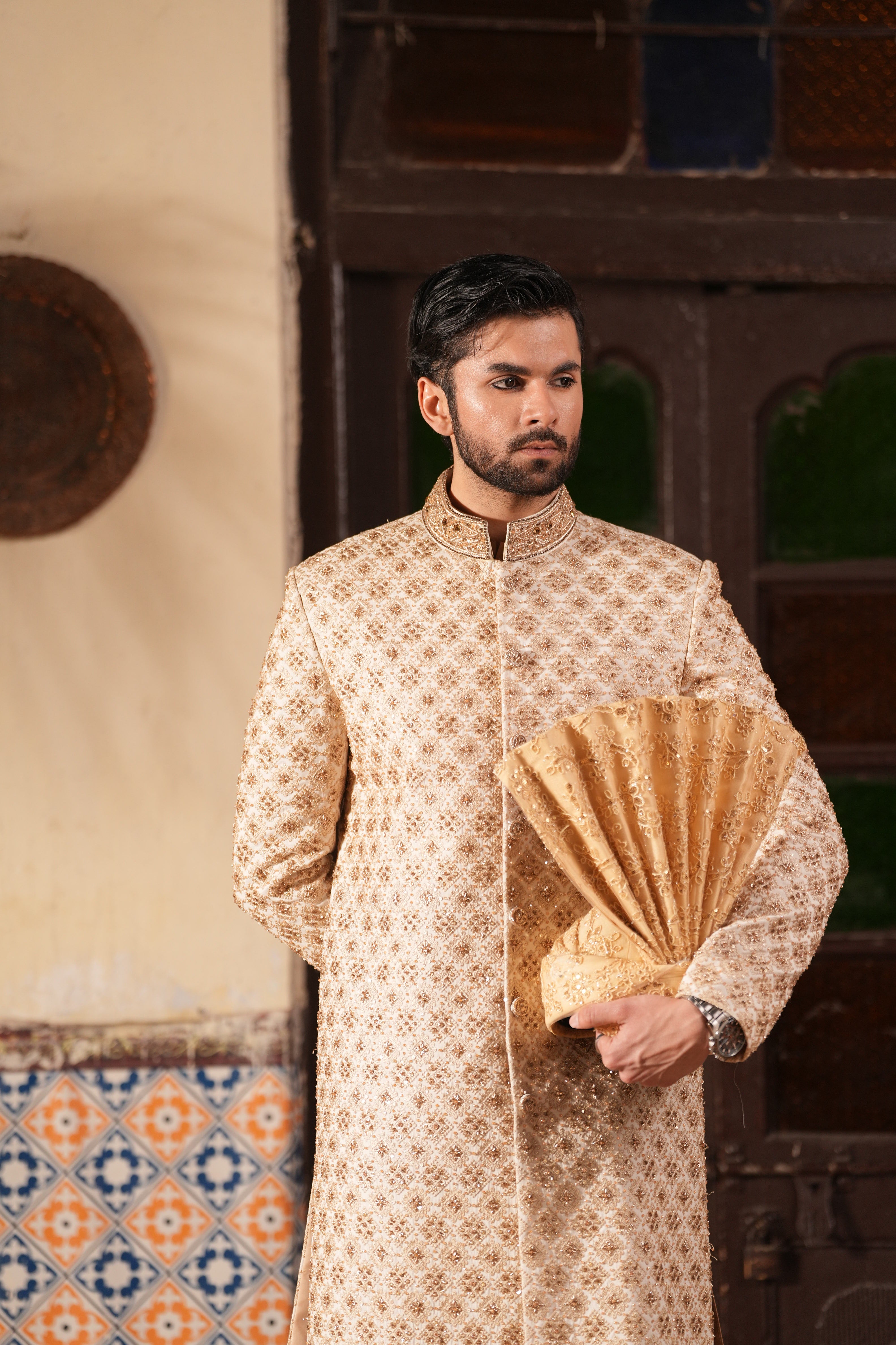 Groom styled in Mehr Raaj couture sherwani for a regal wedding look
