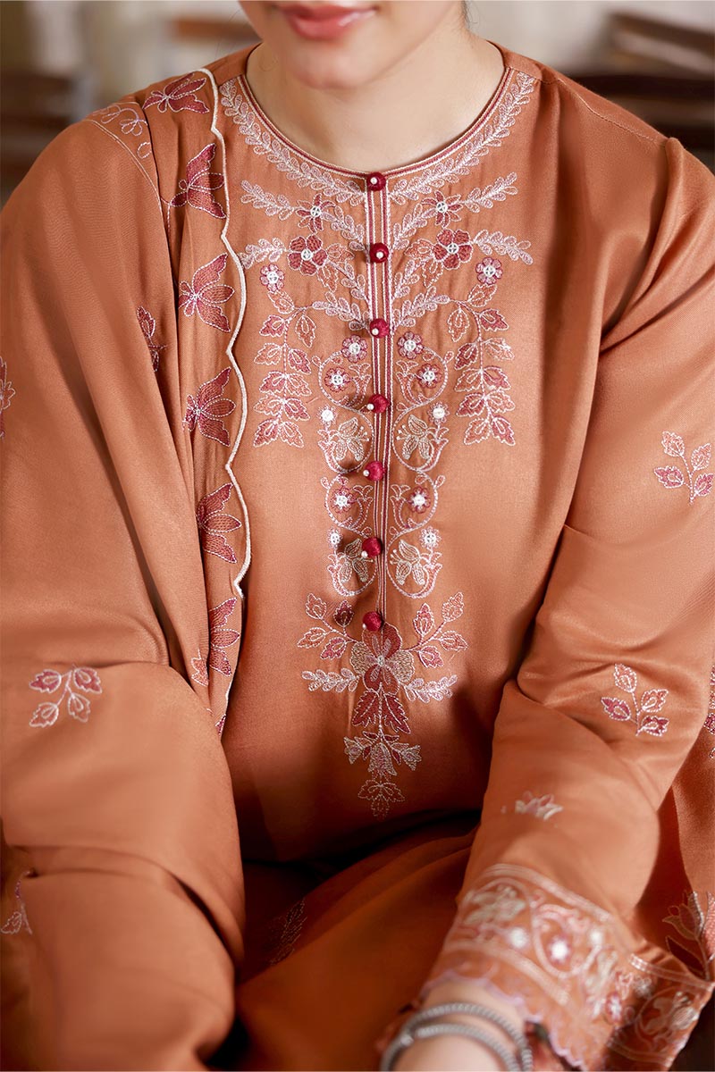 Winter-ready elegance in rust — shop now at Highway Fashion.