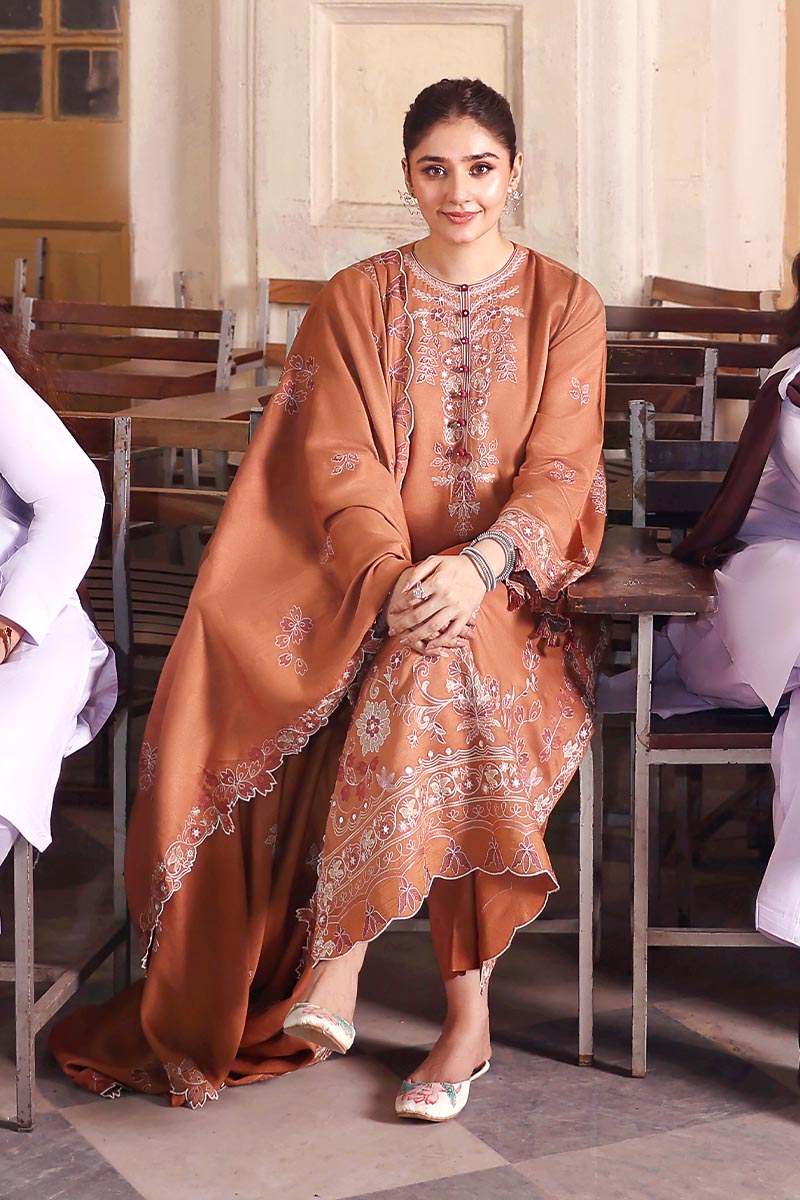 Winter-ready elegance in rust — shop now at Highway Fashion.