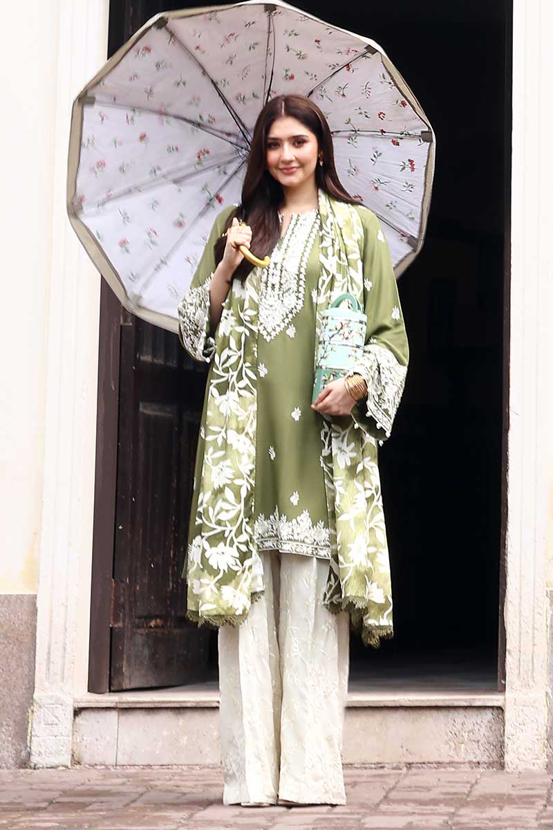 Soft linen, rich embroidery — the perfect winter look by Cross Stitch.