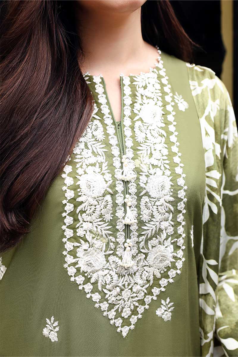 Soft linen, rich embroidery — the perfect winter look by Cross Stitch.