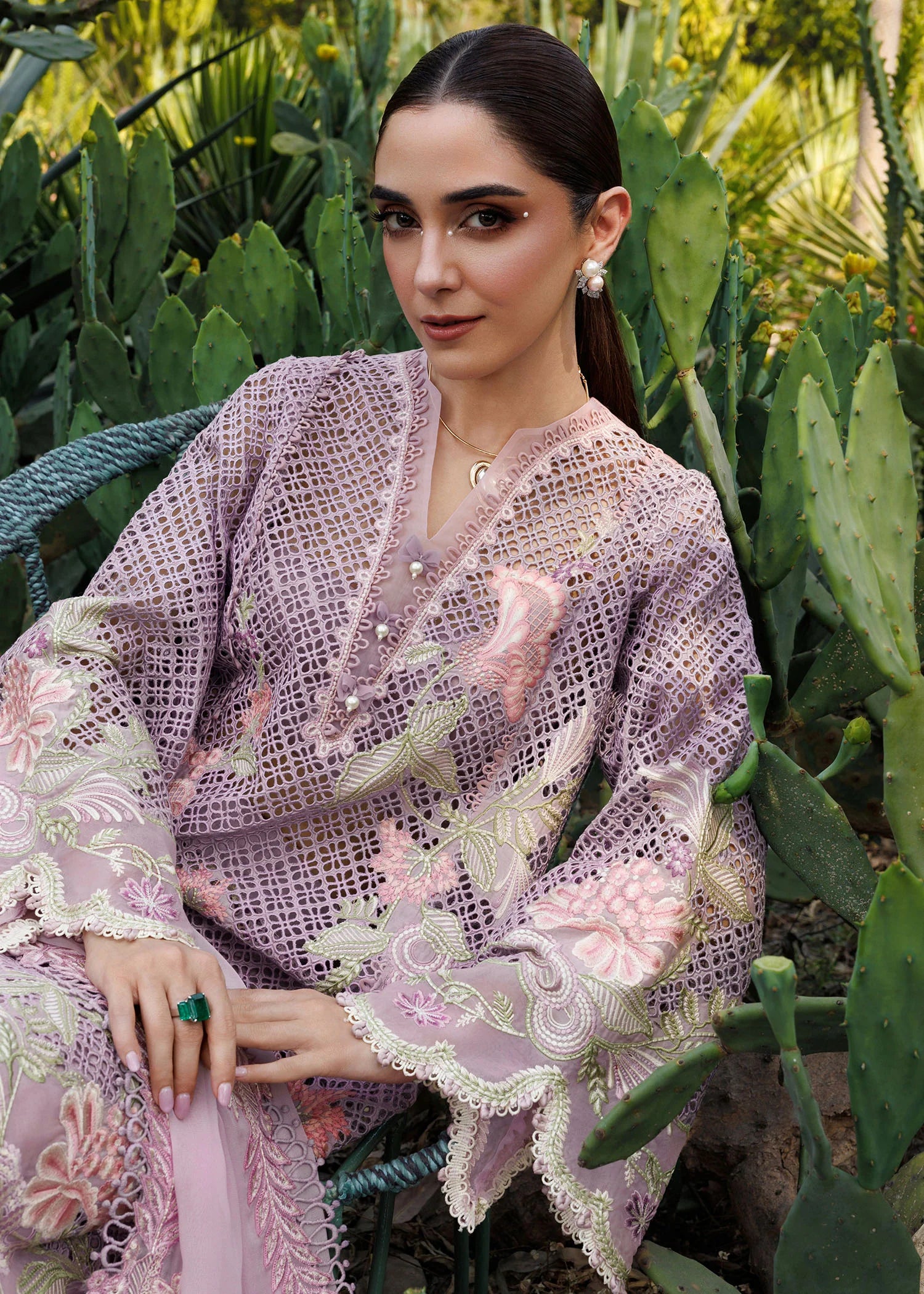 Embroidered sleeve borders and cutwork detailing