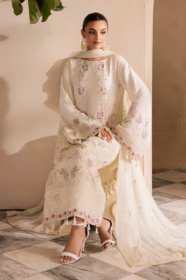 Close-up of embroidered chiffon sleeves with organza lace