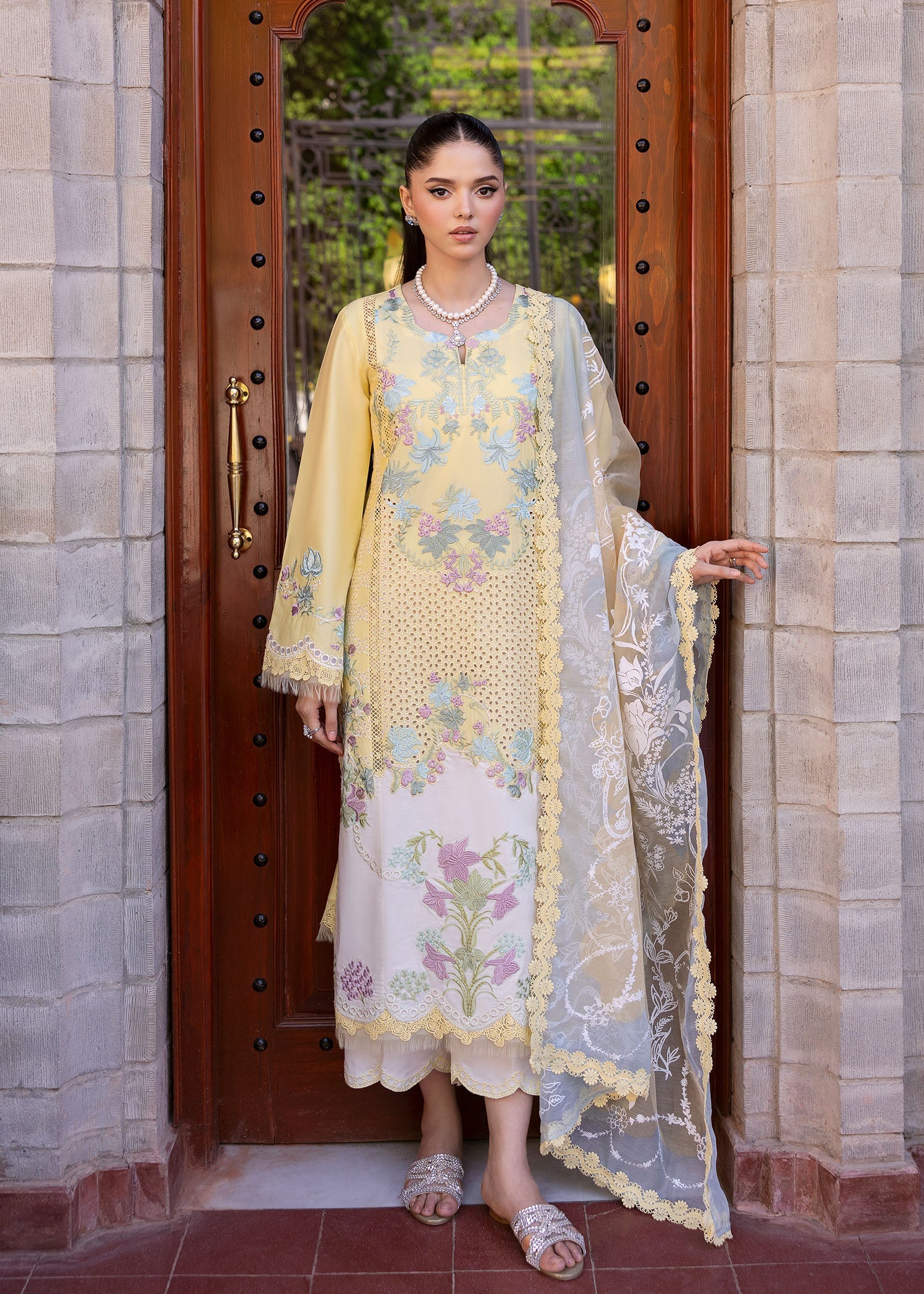 Detailed embroidery on the front lower daman in lime yellow