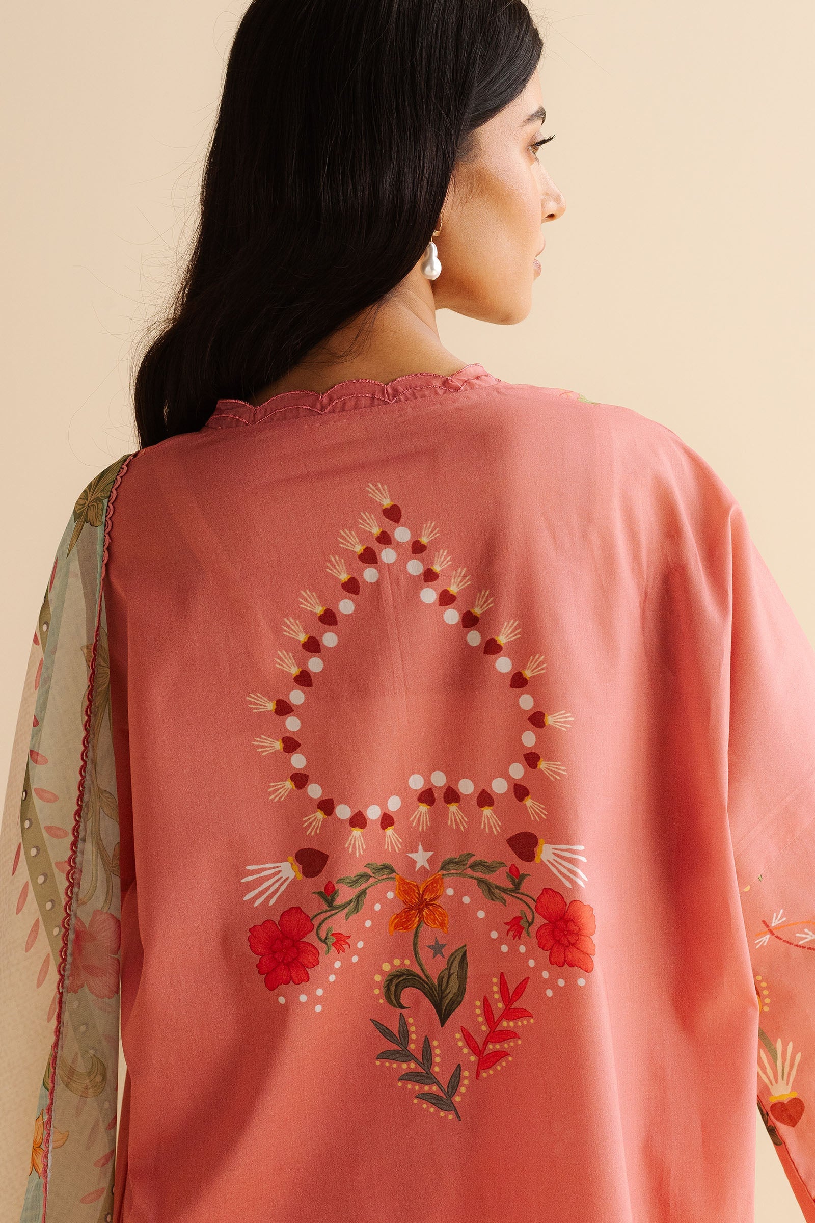 Back design of Nyra-5B printed shirt from COCO Prints '25